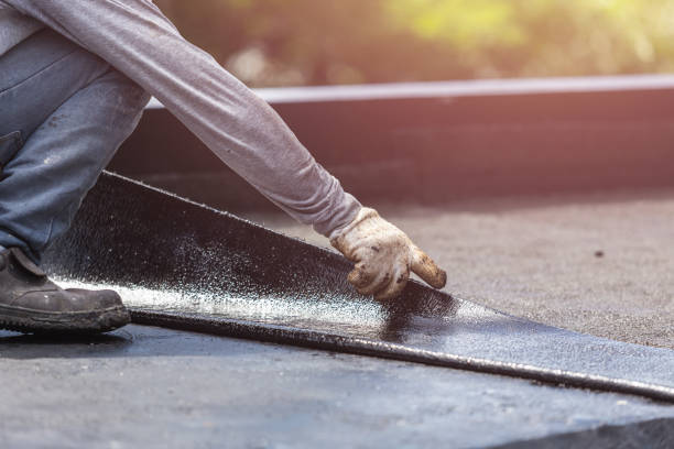 Professional Emergency Waterproofing technician working in Macon, IL